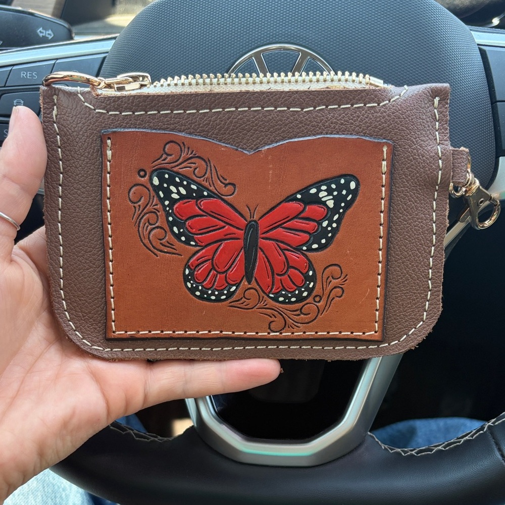 Handcrafted Brown Leather Coin Purse with Red Butterfly Accent